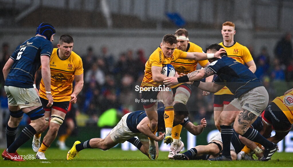1 April 2023; Mike Lowry of Ulster is tackled by Hugo Keenan and Andrew Porter of Leinster during the Heineken Champions Cup Round of 16 match between Leinster and Ulster at Aviva Stadium in Dublin. Photo by Sam Barnes/Sportsfile