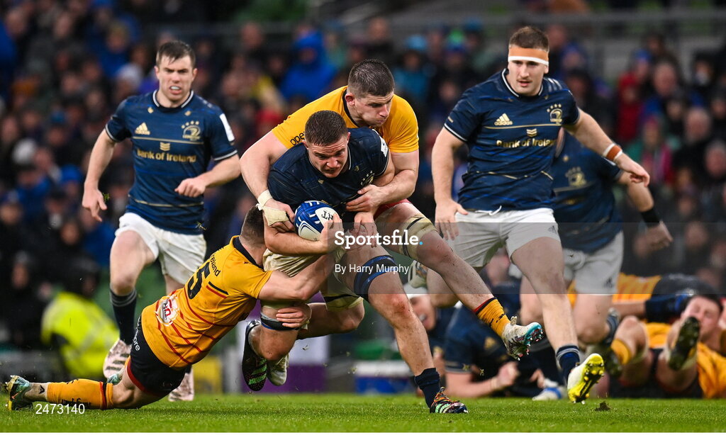 1 April 2023; Scott Penny of Leinster is tackled by Mike Lowry, left, and Nick Timoney of Ulster during the Heineken Champions Cup Round of 16 match between Leinster and Ulster at the Aviva Stadium in Dublin. Photo by Harry Murphy/Sportsfile