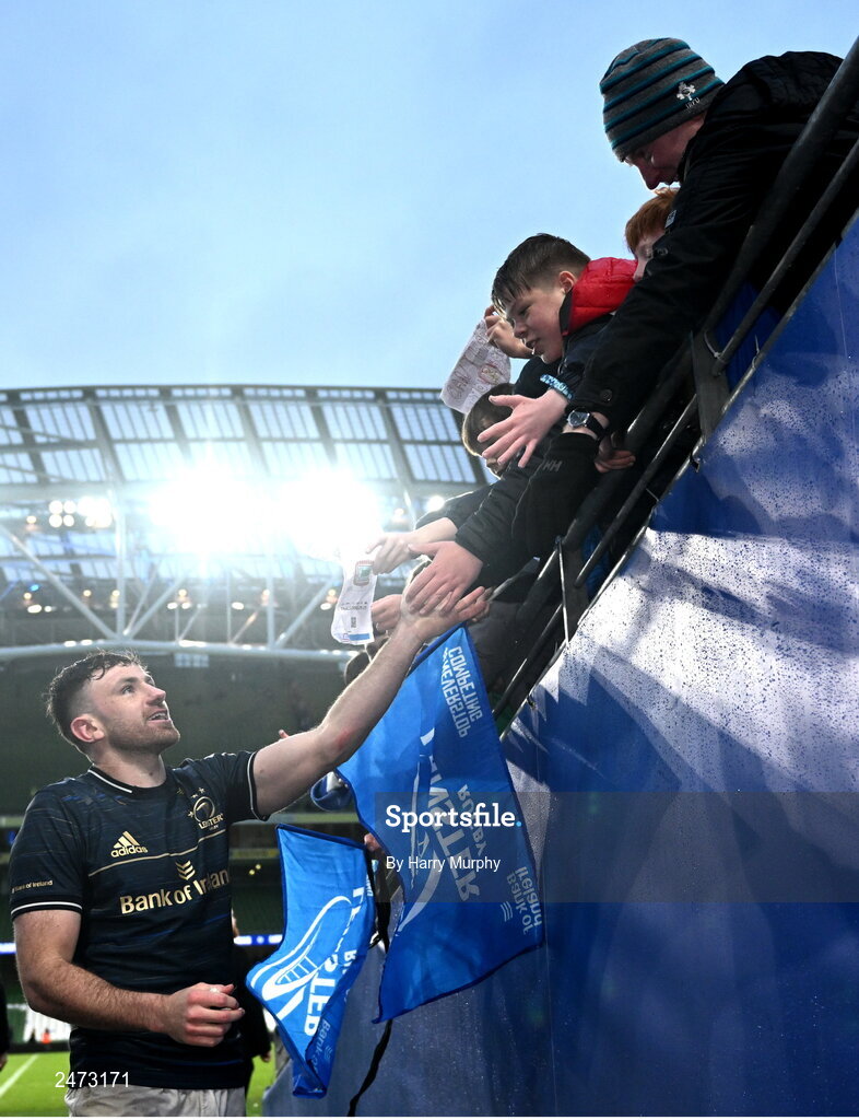 1 April 2023; Hugo Keenan of Leinster with supporters after the Heineken Champions Cup Round of 16 match between Leinster and Ulster at the Aviva Stadium in Dublin. Photo by Harry Murphy/Sportsfile
