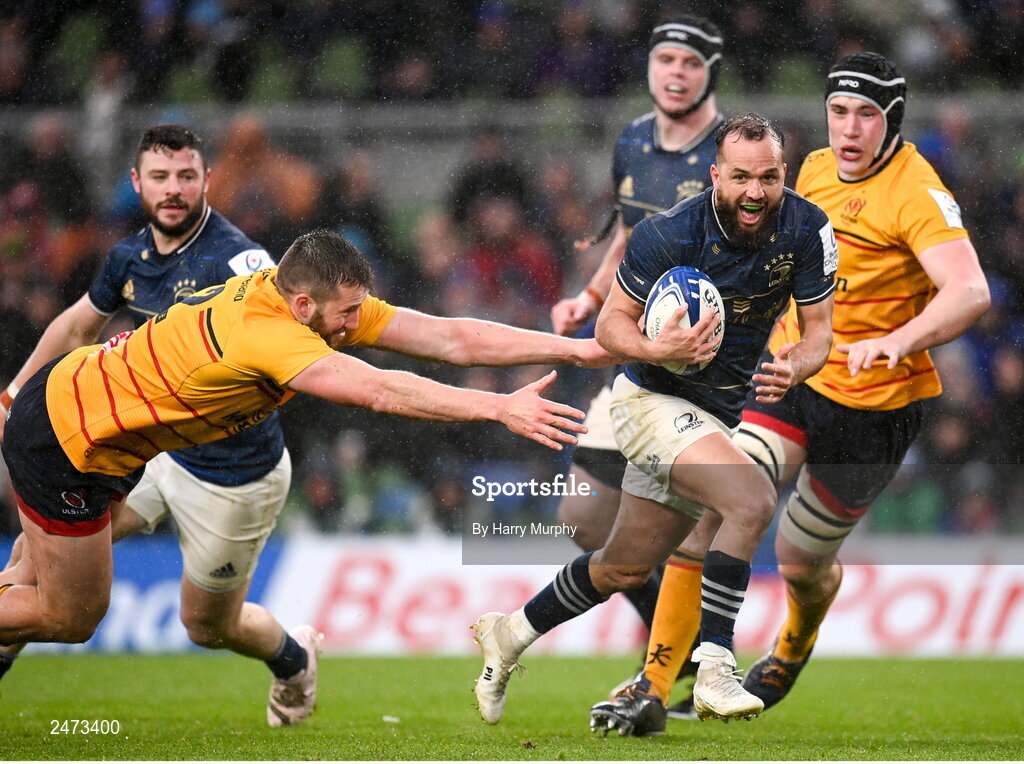 1 April 2023; Jamison Gibson-Park of Leinster evades the tackle of Stuart McCloskey of Ulster on his way to scoring his side's second try during the Heineken Champions Cup Round of 16 match between Leinster and Ulster at Aviva Stadium in Dublin. Photo by Harry Murphy/Sportsfile