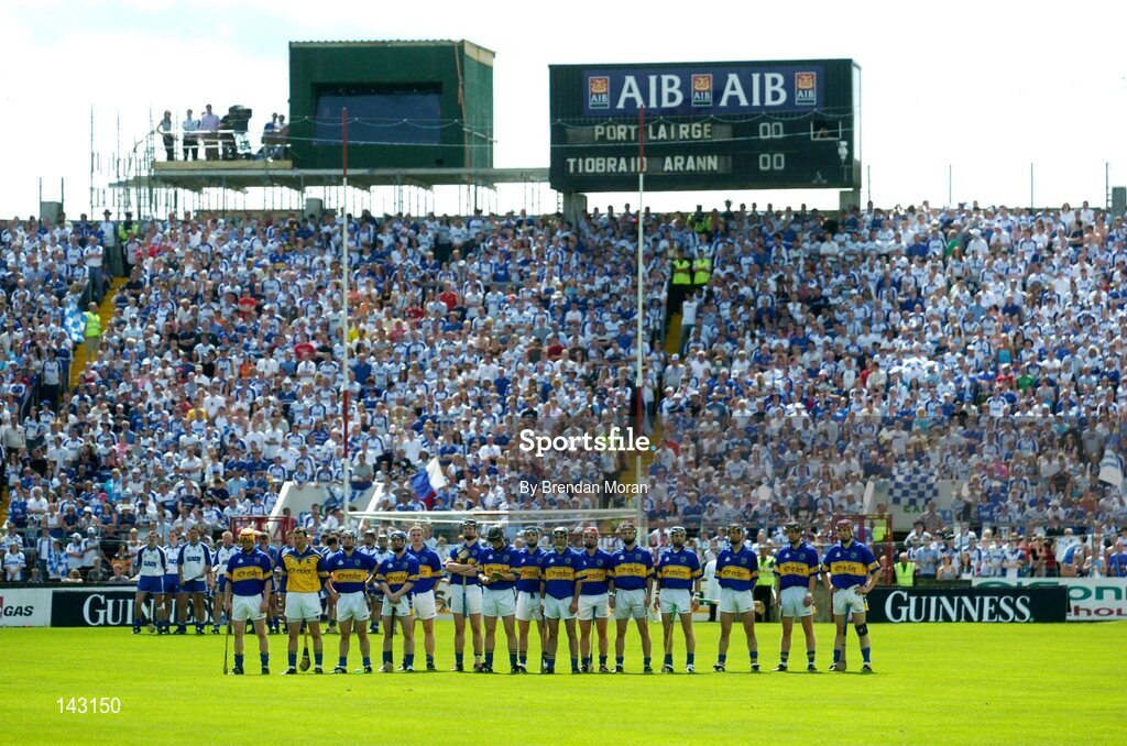6 June 2004; The Tipperary and Waterford teams stand for the national anthem before the game. Guinness Munster Senior Hurling Championship semi-final, Tipperary v Waterford, Pairc Ui Chaoimh, Cork. Picture credit; Brendan Moran / SPORTSFILE