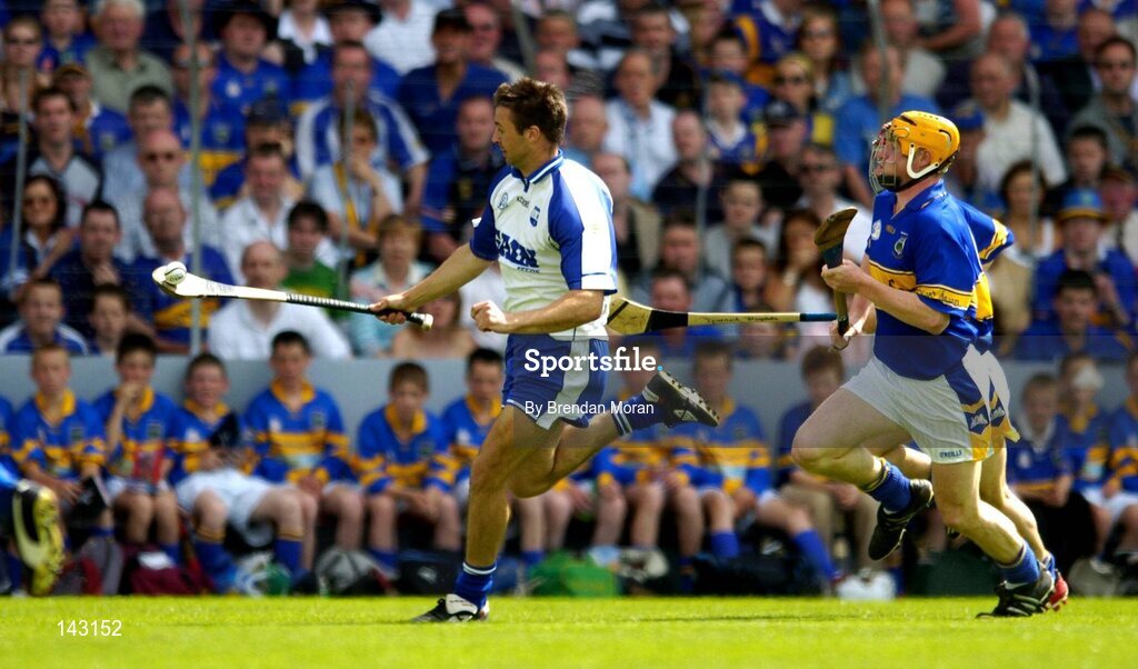 6 June 2004; Dan Shanahan, Waterford, in action against Eamonn Corcoran, Tipperary. Guinness Munster Senior Hurling Championship semi-final, Tipperary v Waterford, Pairc Ui Chaoimh, Cork. Picture credit; Brendan Moran / SPORTSFILE