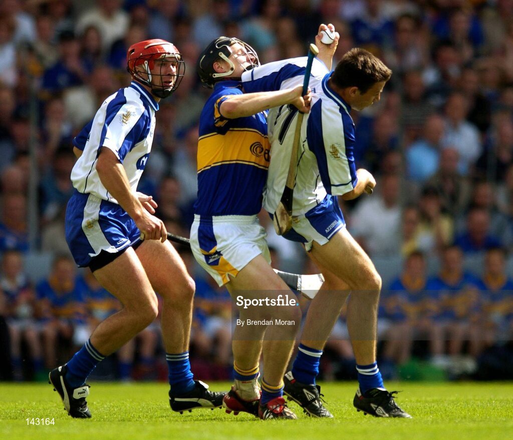 6 June 2004; Philip Maher, Tipperary, in action against Seamus Prendegast, left, and Dan Shanahan, Waterford. Guinness Munster Senior Hurling Championship semi-final, Tipperary v Waterford, Pairc Ui Chaoimh, Cork. Picture credit; Brendan Moran / SPORTSFILE