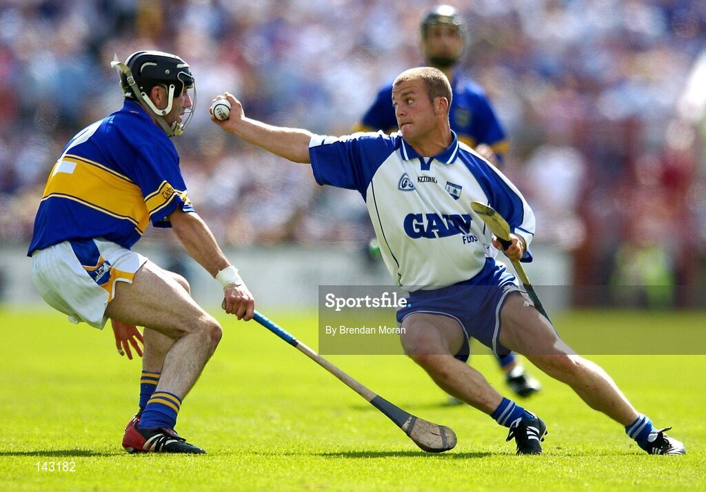 6 June 2004; Eoin McGrath, Waterford, in action against Thomas Costello, Tipperary. Guinness Munster Senior Hurling Championship semi-final, Tipperary v Waterford, Pairc Ui Chaoimh, Cork. Picture credit; Brendan Moran / SPORTSFILE