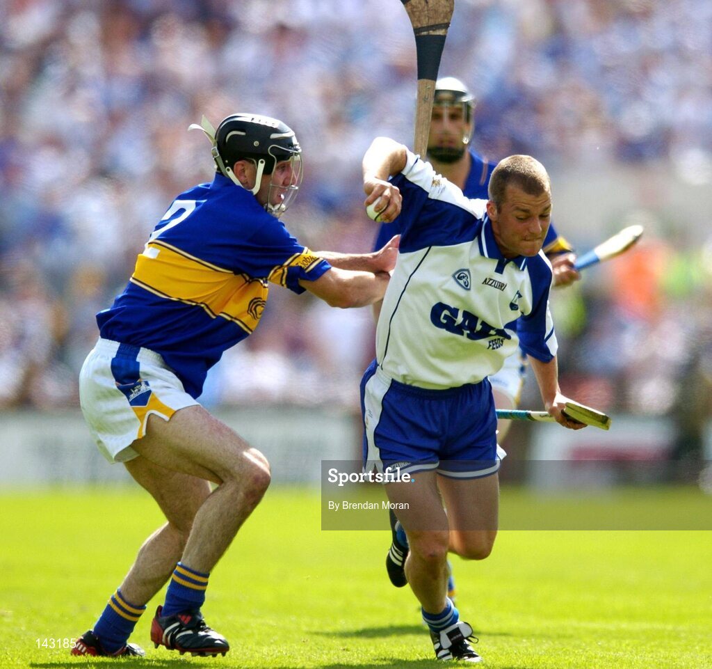 6 June 2004; Eoin McGrath, Waterford, in action against Thomas Costello, Tipperary. Guinness Munster Senior Hurling Championship semi-final, Tipperary v Waterford, Pairc Ui Chaoimh, Cork. Picture credit; Brendan Moran / SPORTSFILE
