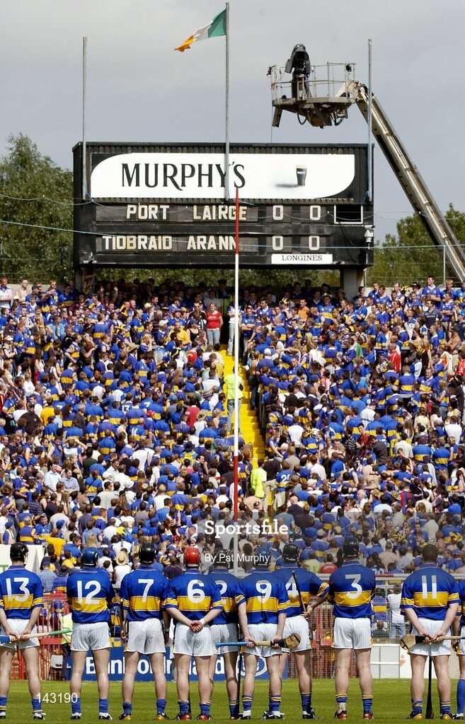 6 June 2004; The Tipperary team stand for the national anthem. Guinness Munster Senior Hurling Championship Semi-Final, Tipperary v Waterford, Pairc Ui Chaoimh, Cork. Picture credit; Pat Murphy / SPORTSFILE