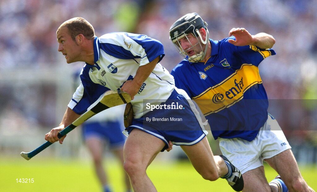 6 June 2004; Eoin McGrath, Waterford, in action against Thomas Costello, Tipperary. Guinness Munster Senior Hurling Championship semi-final, Tipperary v Waterford, Pairc Ui Chaoimh, Cork. Picture credit; Brendan Moran / SPORTSFILE
