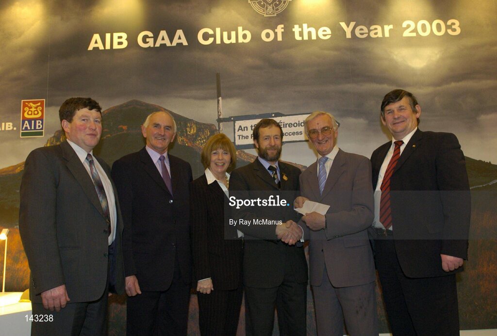 2 February 2004; At the AIB GAA Club of the Year Awards 2003 in Croke Park are members of Holy-Cross, Ballycahill GAA Club, Tipperary, with Sean Kelly, President of the GAA. Croke Park, Dublin. Picture credit; Ray McManus / SPORTSFILE