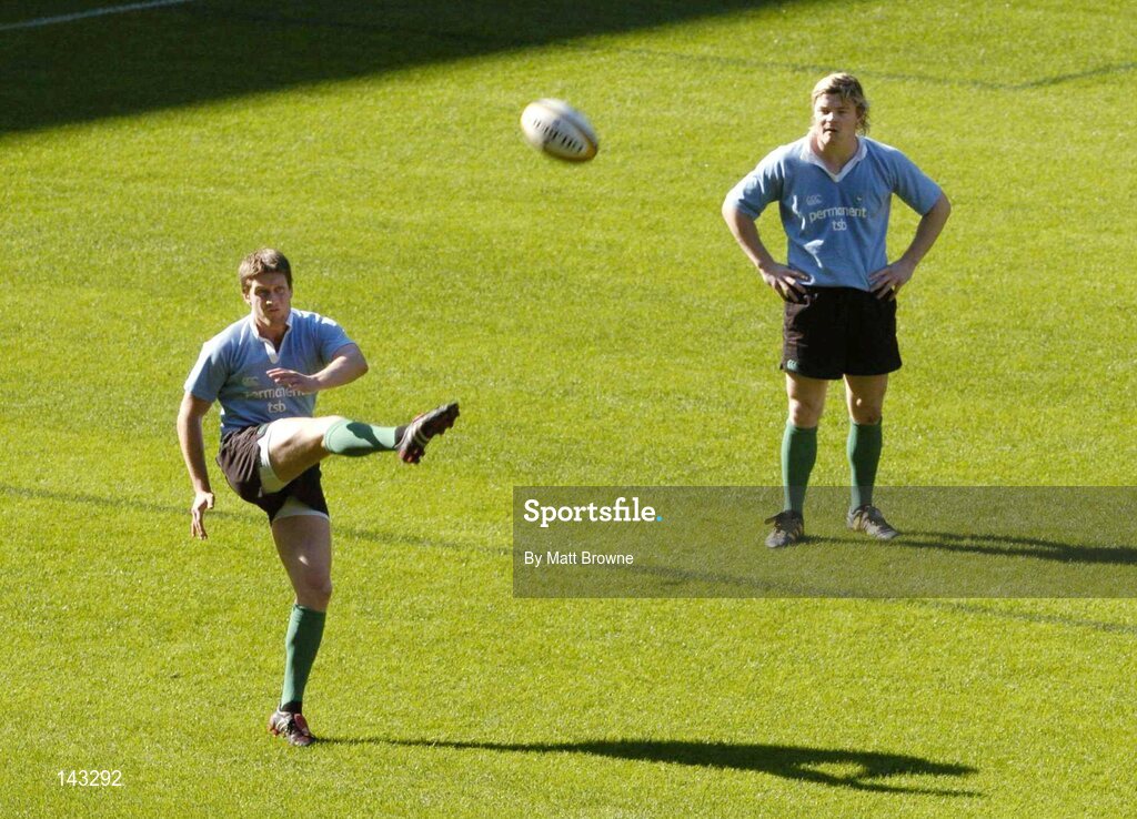 18 June 2004; Ronan O'Gara in action during rugby squad training as Irish captain Brian O'Driscoll looks on. Newlans Rugby Stadium, Cape Town, South Africa. Picture credit; Matt Browne / SPORTSFILE