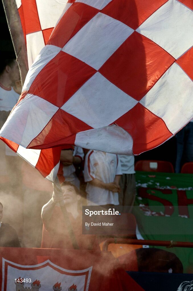 28 May 2004; A Shelbourne supporter waves a Shelbourne flag before the start of the game. eircom league, Premier Division, Shelbourne v Bohemians, Tolka Park, Dublin. Picture credit; David Maher / SPORTSFILE