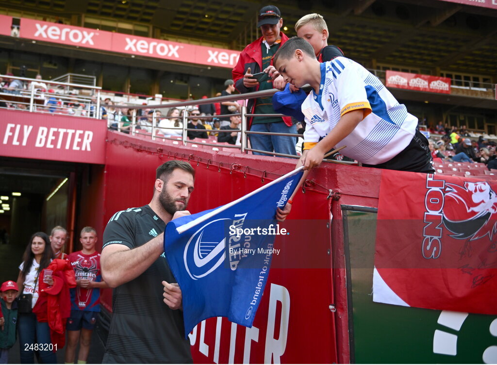 15 April 2023; Jason Jenkins of Leinster signs an autograph for Leinster supporter Franco Swanepoel before the United Rugby Championship match between Emirates Lions and Leinster at Emirates Airlines Park in Johannesburg, South Africa. Photo by Harry Murphy/Sportsfile