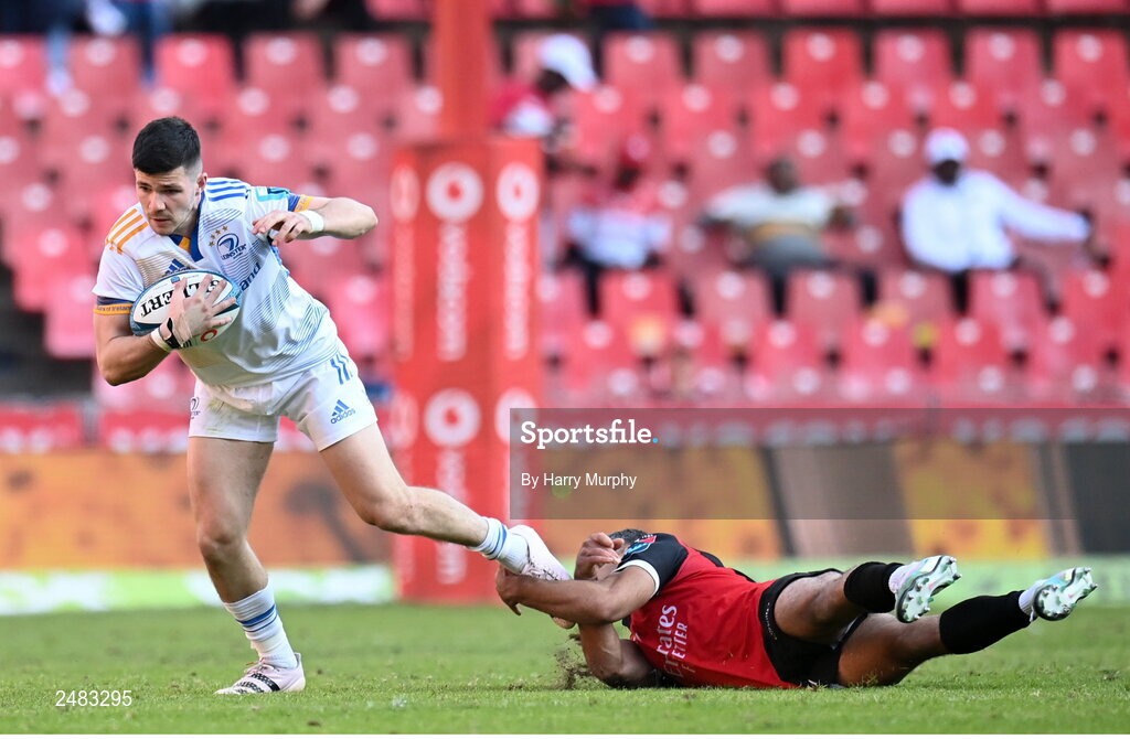 15 April 2023; Chris Cosgrave of Leinster evades the tackle of Manuel Rass of Emirates Lions during the United Rugby Championship match between Emirates Lions and Leinster at Emirates Airlines Park in Johannesburg, South Africa. Photo by Harry Murphy/Sportsfile