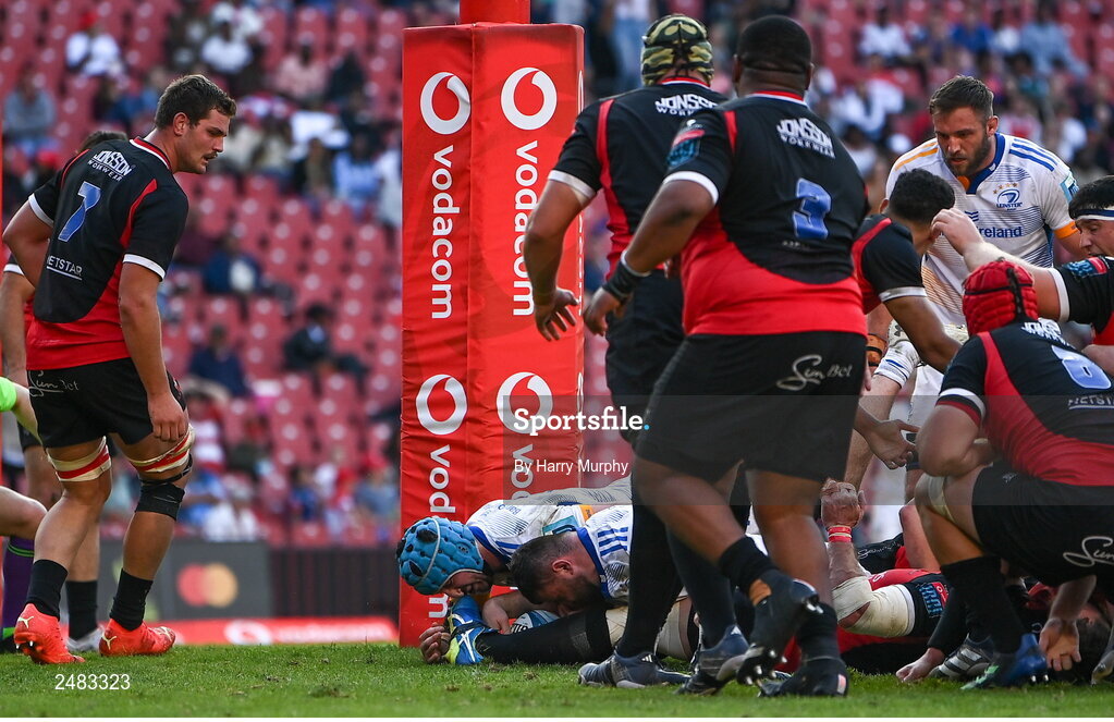 15 April 2023; Michael Milne of Leinster, supported by teammate Will Connors, dives over to score his side's third try during the United Rugby Championship match between Emirates Lions and Leinster at Emirates Airlines Park in Johannesburg, South Africa. Photo by Harry Murphy/Sportsfile