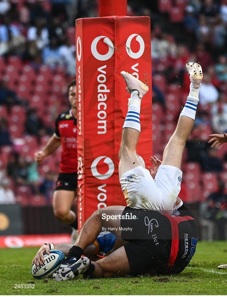 15 April 2023; Chris Cosgrave of Leinster scores his side's fifth try despite the tackle of Morne Brandon of Emirates Lions during the United Rugby Championship match between Emirates Lions and Leinster at Emirates Airlines Park in Johannesburg, South Africa. Photo by Harry Murphy/Sportsfile