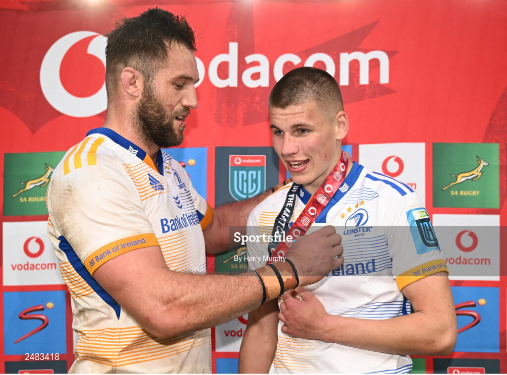 15 April 2023; Jason Jenkins of Leinster presents the player of the match award to teammate Sam Prendergast after the United Rugby Championship match between Emirates Lions and Leinster at Emirates Airlines Park in Johannesburg, South Africa. Photo by Harry Murphy/Sportsfile