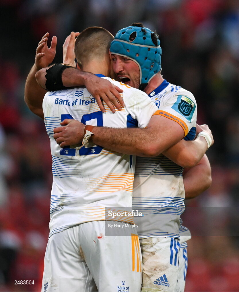 15 April 2023; Sam Prendergast of Leinster is embraced by teammate Will Connors after kicking a penalty to win the United Rugby Championship match between Emirates Lions and Leinster at Emirates Airlines Park in Johannesburg, South Africa. Photo by Harry Murphy/Sportsfile