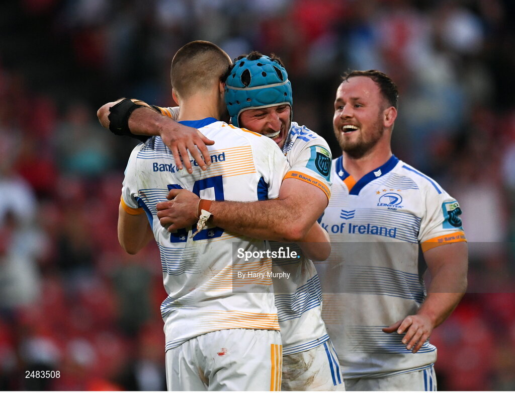 15 April 2023; Sam Prendergast of Leinster is embraced by teammates Will Connors and Ed Byrne after kicking a penalty to win the United Rugby Championship match between Emirates Lions and Leinster at Emirates Airlines Park in Johannesburg, South Africa. Photo by Harry Murphy/Sportsfile