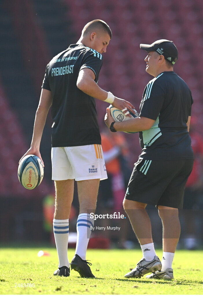 15 April 2023; Sam Prendergast of Leinster and Leinster academy manager Simon Broughton during the United Rugby Championship match between Emirates Lions and Leinster at Emirates Airlines Park in Johannesburg, South Africa. Photo by Harry Murphy/Sportsfile