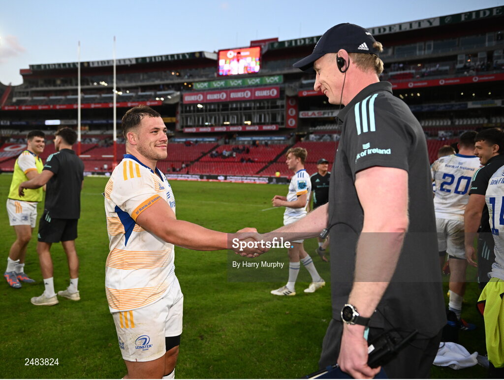 15 April 2023; Tadgh McElroy of Leinster and Leinster head coach Leo Cullen after their side's victory in the United Rugby Championship match between Emirates Lions and Leinster at Emirates Airlines Park in Johannesburg, South Africa. Photo by Harry Murphy/Sportsfile