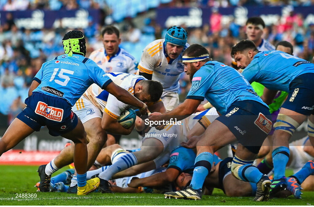 22 April 2023; Michael Milne of Leinster on his way to scoring his side's first try despite the tackle of Kurt-Lee Arendse and Gerhard Steenekamp of Vodacom Bulls  during the United Rugby Championship match between Vodacom Bulls and Leinster at Loftus Versfeld Stadium in Pretoria, South Africa. Photo by Harry Murphy/Sportsfile