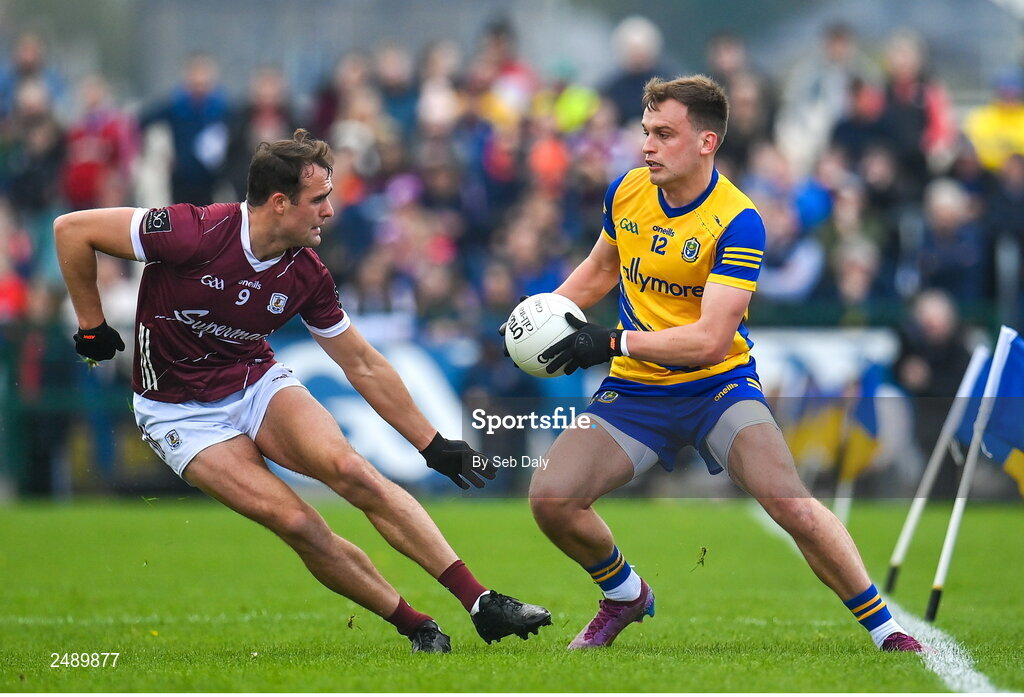 23 April 2023; Enda Smith of Roscommon in action against John Maher of Galway during the Connacht GAA Football Senior Championship Semi-Final match between Roscommon and Galway at Dr Hyde Park in Roscommon. Photo by Seb Daly/Sportsfile