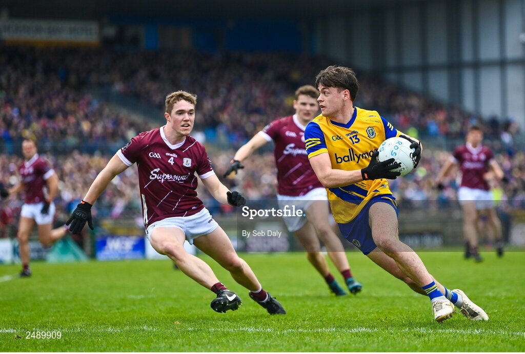 23 April 2023; Ben O’Carroll of Roscommon in action against Jack Glynn of Galway during the Connacht GAA Football Senior Championship Semi-Final match between Roscommon and Galway at Dr Hyde Park in Roscommon. Photo by Seb Daly/Sportsfile