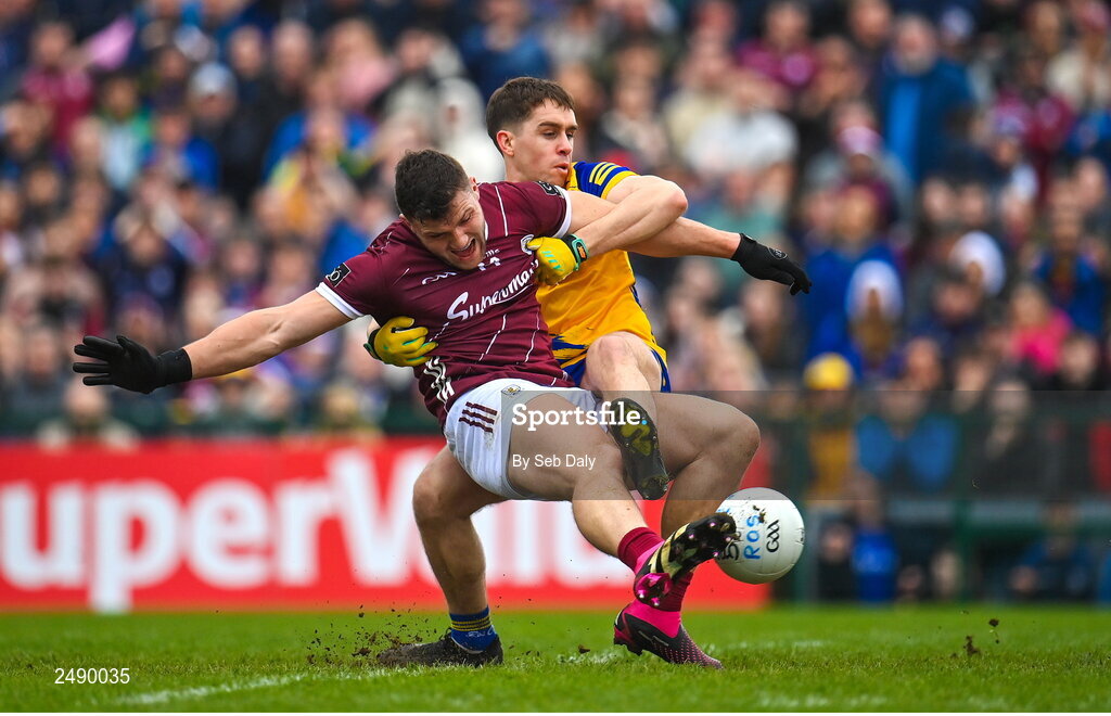 23 April 2023; Damien Comer of Galway scores his side's first goal, despite the tackle of Roscommon's David Murray, during the Connacht GAA Football Senior Championship Semi-Final match between Roscommon and Galway at Dr Hyde Park in Roscommon. Photo by Seb Daly/Sportsfile