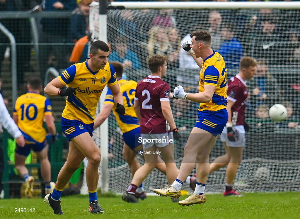23 April 2023; Cian McKeon of Roscommon, right, celebrates his side's first, scored by teammates Ciarán Murtagh, 10, during the Connacht GAA Football Senior Championship Semi-Final match between Roscommon and Galway at Dr Hyde Park in Roscommon. Photo by Seb Daly/Sportsfile