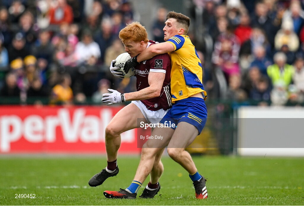 23 April 2023; Peter Cooke of Galway in action against Dylan Ruane of Roscommon during the Connacht GAA Football Senior Championship Semi-Final match between Roscommon and Galway at Dr Hyde Park in Roscommon. Photo by Seb Daly/Sportsfile