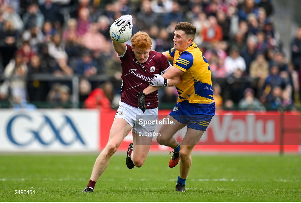 23 April 2023; Peter Cooke of Galway in action against Dylan Ruane of Roscommon during the Connacht GAA Football Senior Championship Semi-Final match between Roscommon and Galway at Dr Hyde Park in Roscommon. Photo by Seb Daly/Sportsfile