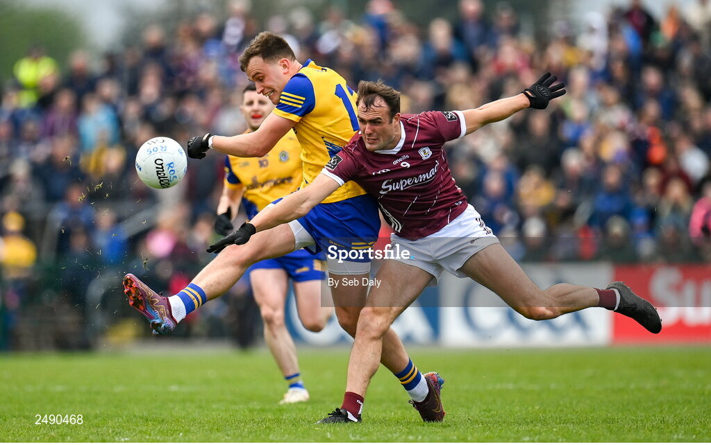23 April 2023; Enda Smith of Roscommon in action against John Maher of Galway during the Connacht GAA Football Senior Championship Semi-Final match between Roscommon and Galway at Dr Hyde Park in Roscommon. Photo by Seb Daly/Sportsfile