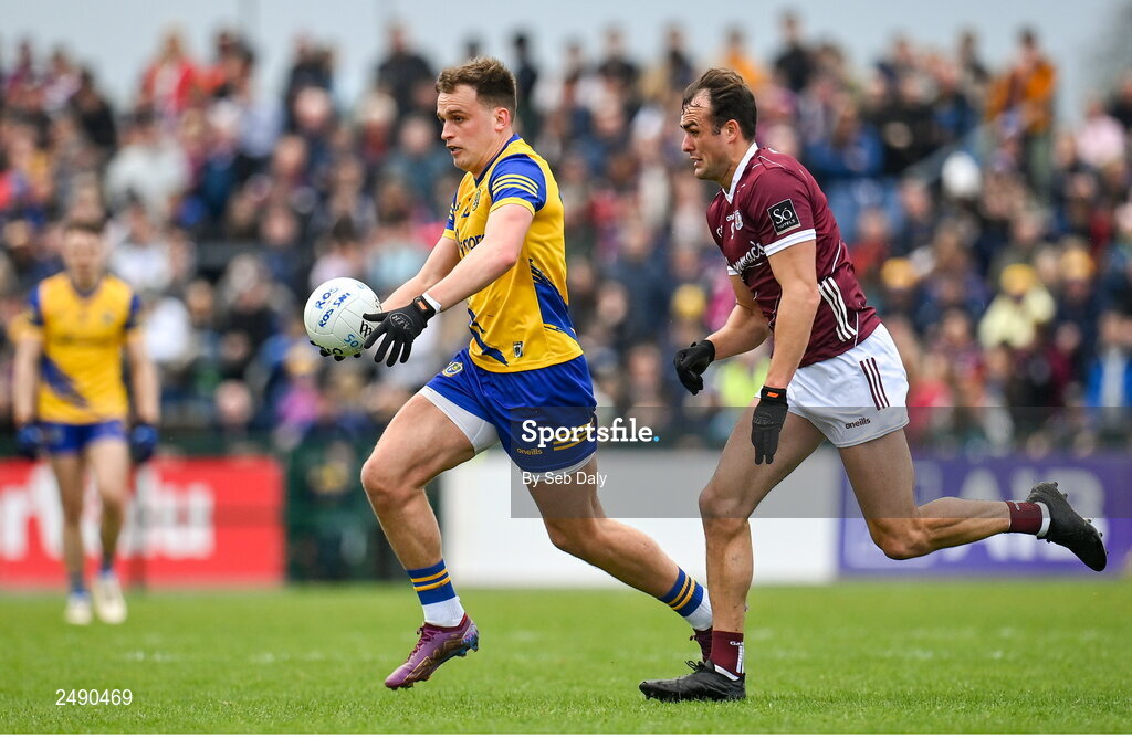 23 April 2023; Enda Smith of Roscommon in action against John Maher of Galway during the Connacht GAA Football Senior Championship Semi-Final match between Roscommon and Galway at Dr Hyde Park in Roscommon. Photo by Seb Daly/Sportsfile