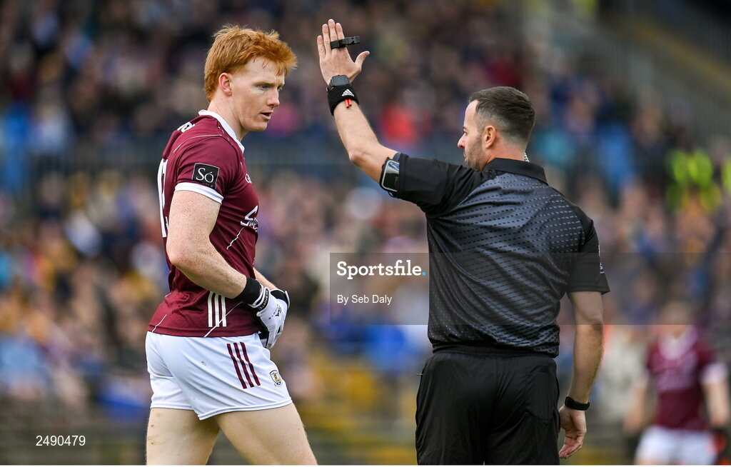 23 April 2023; Peter Cooke of Galway and referee David Gough during the Connacht GAA Football Senior Championship Semi-Final match between Roscommon and Galway at Dr Hyde Park in Roscommon. Photo by Seb Daly/Sportsfile