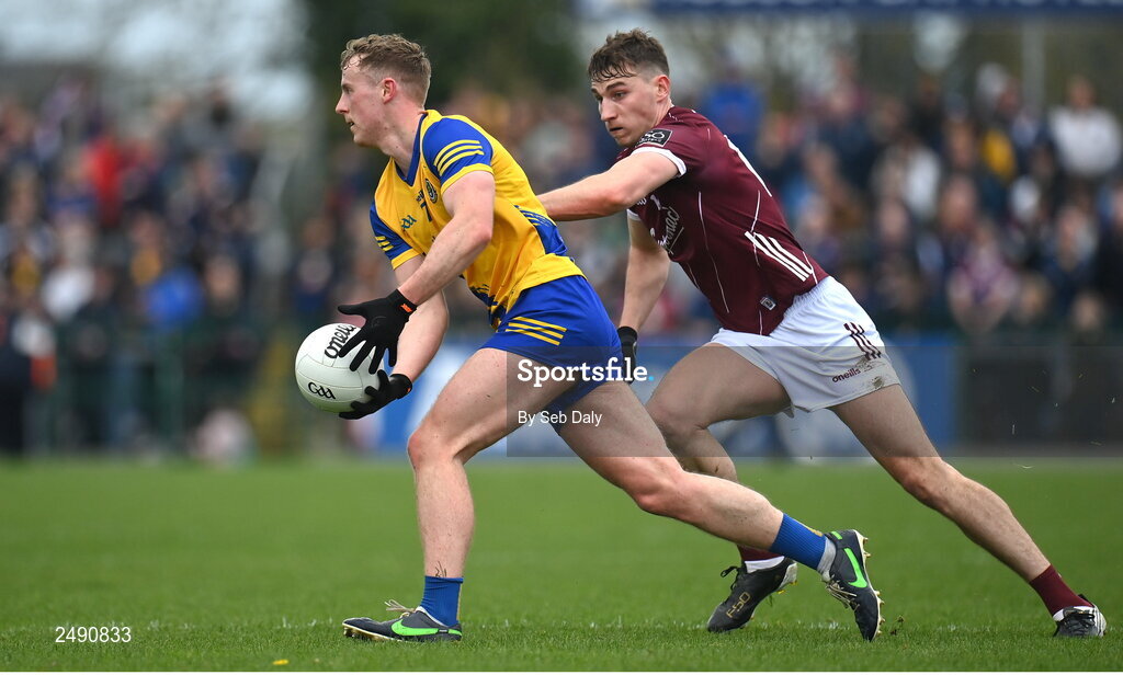 23 April 2023; Eoin McCormack of Roscommon in action against Matthew Tierney of Galway during the Connacht GAA Football Senior Championship Semi-Final match between Roscommon and Galway at Dr Hyde Park in Roscommon. Photo by Seb Daly/Sportsfile