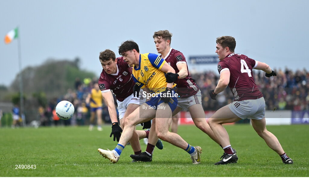 23 April 2023; Ben O’Carroll of Roscommon in action against Galway players, from left, John Daly, Johnny McGrath and Jack Glynn during the Connacht GAA Football Senior Championship Semi-Final match between Roscommon and Galway at Dr Hyde Park in Roscommon. Photo by Seb Daly/Sportsfile