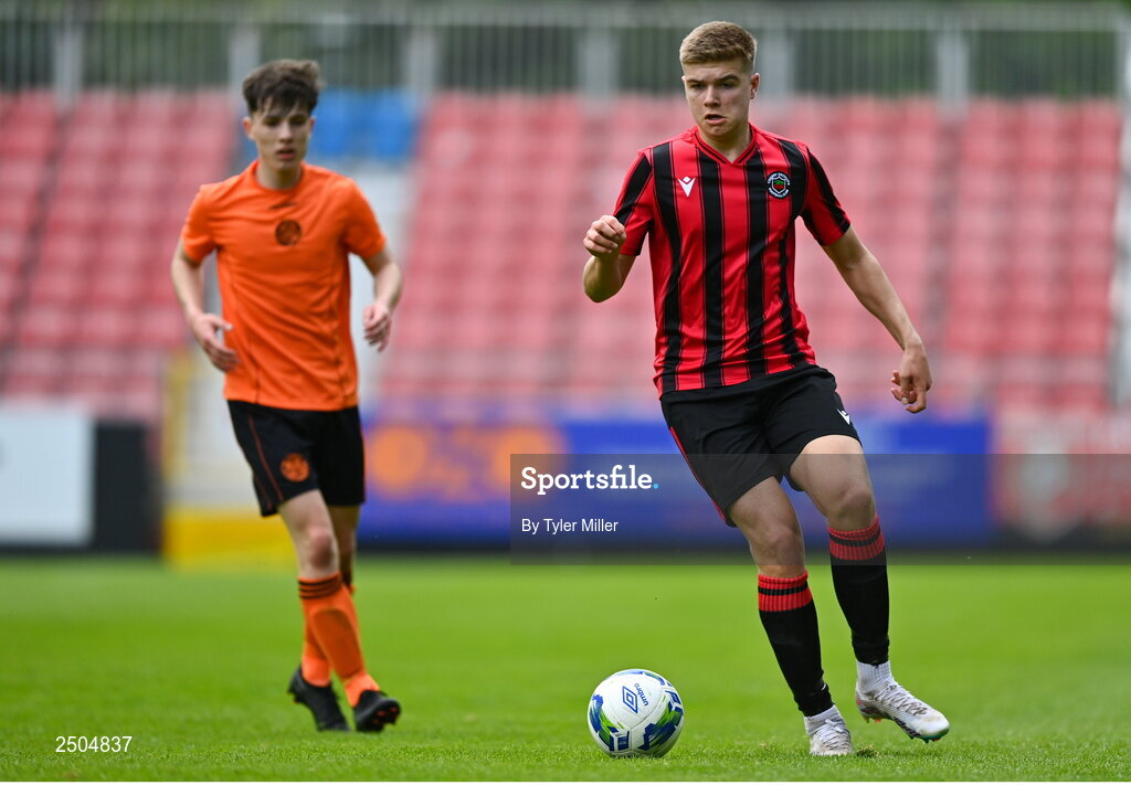 6 May 2023; Troy O'Dowd of Cherry Orchard FC in action against Sean Curran of St Kevin's FC during the FAI Under 17 Cup Final 2022/23 match between Cherry Orchard FC and St Kevin’s Boys FC at Richmond Park in Dublin. Photo by Tyler Miller/Sportsfile