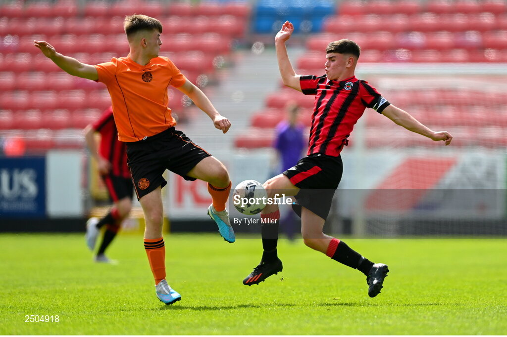 6 May 2023; Luke O'Connor of St Kevin's FC in action against Dane Mahon of Cherry Orchard FC during the FAI Under 17 Cup Final 2022/23 match between Cherry Orchard FC and St Kevin’s Boys FC at Richmond Park in Dublin. Photo by Tyler Miller/Sportsfile