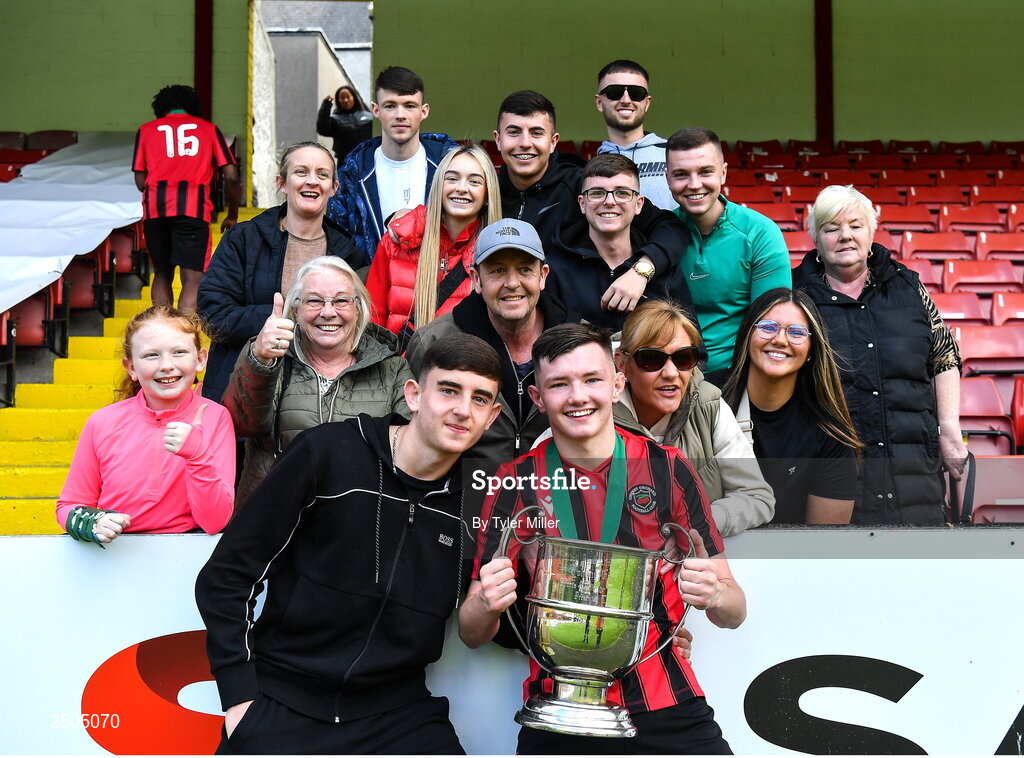 6 May 2023; Ger Crawley of Cherry Orchard FC has a photograph taken with his family and cup after the FAI Under 17 Cup Final 2022/23 match between Cherry Orchard FC and St Kevin’s Boys FC at Richmond Park in Dublin. Photo by Tyler Miller/Sportsfile