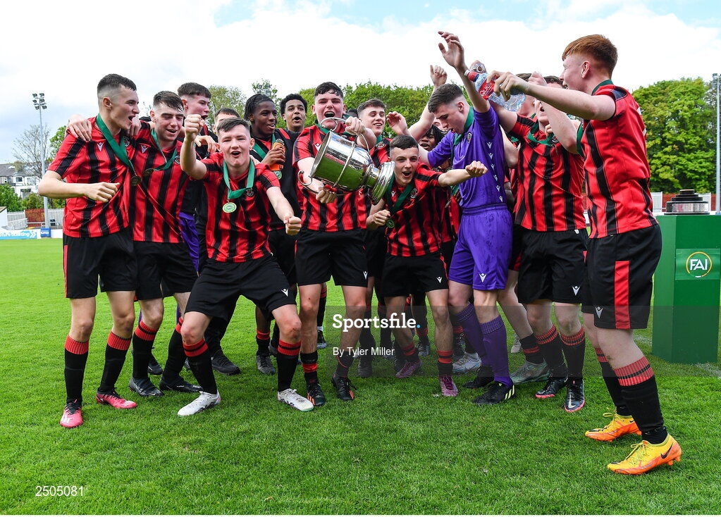 6 May 2023; Cherry Orchard FC players celebrate with the cup after their side's victory in the FAI Under 17 Cup Final 2022/23 match between Cherry Orchard FC and St Kevin’s Boys FC at Richmond Park in Dublin. Photo by Tyler Miller/Sportsfile