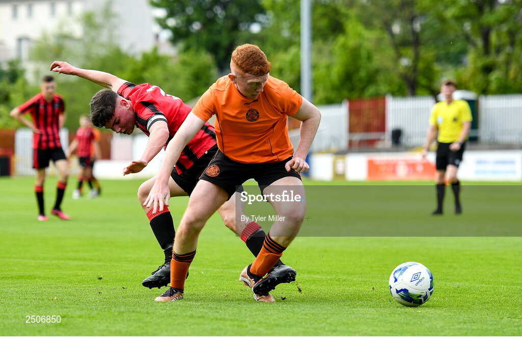 6 May 2023; Jack McDermott of St Kevin's FC in action against Dane Mahon of Cherry Orchard FC during the FAI Under 17 Cup Final 2022/23 match between Cherry Orchard FC and St Kevin’s Boys FC at Richmond Park in Dublin. Photo by Tyler Miller/Sportsfile