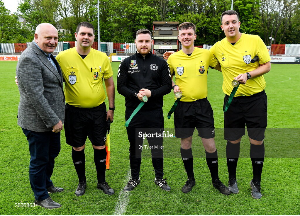 6 May 2023; FAI President, Gerry McAnaney, left, with referee Niall McLoughlin, second from right and his match officials after the FAI Under 17 Cup Final 2022/23 match between Cherry Orchard FC and St Kevin’s Boys FC at Richmond Park in Dublin. Photo by Tyler Miller/Sportsfile