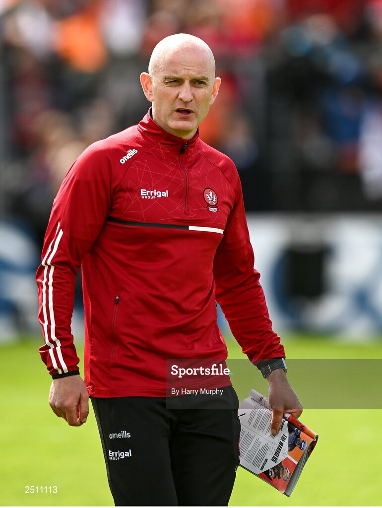 14 May 2023; Derry interim manager Ciaran Meenagh holds the match programme showing former Derry manager Rory Gallagher during the Ulster GAA Football Senior Championship Final match between Armagh and Derry at St Tiernach’s Park in Clones, Monaghan. Photo by Harry Murphy/Sportsfile