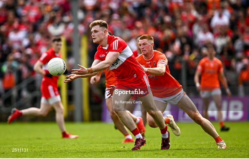 14 May 2023; Ethan Doherty of Derry in action against Ciaran Mackin of Armagh during the Ulster GAA Football Senior Championship Final match between Armagh and Derry at St Tiernach’s Park in Clones, Monaghan. Photo by Ramsey Cardy/Sportsfile
