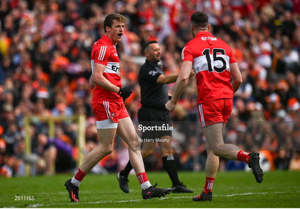 14 May 2023; Brendan Rogers of Derry, left, celebrates after scoring his side's first goal during the Ulster GAA Football Senior Championship Final match between Armagh and Derry at St Tiernach’s Park in Clones, Monaghan. Photo by Harry Murphy/Sportsfile