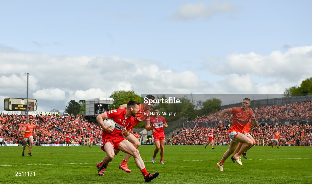 14 May 2023; Niall Loughlin of Derry in action against Jarly Óg Burns of Armagh during the Ulster GAA Football Senior Championship Final match between Armagh and Derry at St Tiernach’s Park in Clones, Monaghan. Photo by Harry Murphy/Sportsfile