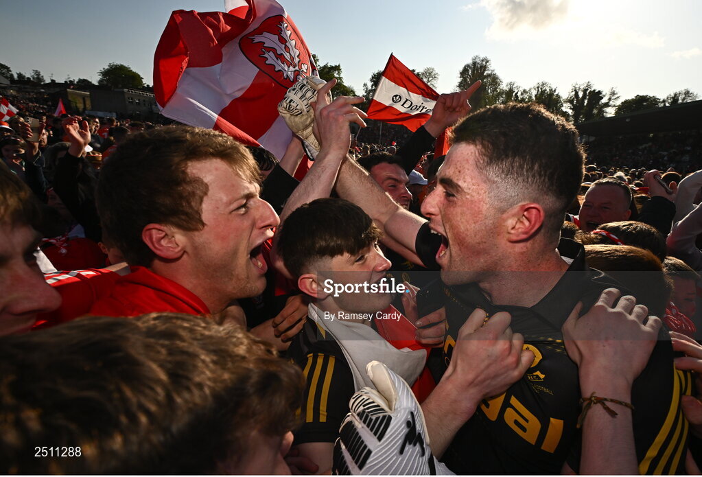 14 May 2023; Derry players Brendan Rogers, left, and goalkeeper Odhran Lynch celebrate after their victory in the Ulster GAA Football Senior Championship Final match between Armagh and Derry at St Tiernach’s Park in Clones, Monaghan. Photo by Ramsey Cardy/Sportsfile