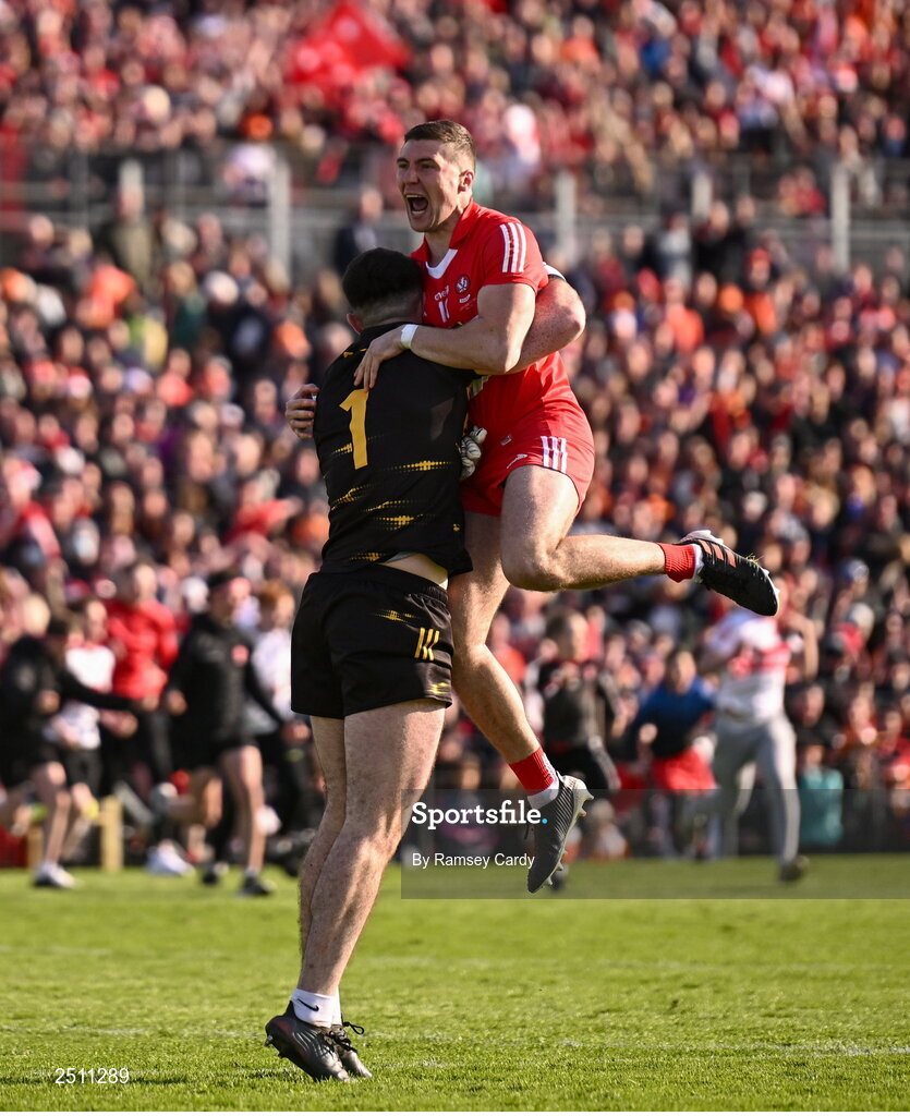 14 May 2023; Ciaran McFaul of Derry, right, celebrates with goalkeeper Odhran Lynch after kicking the winning penalty in the penalty shoot-out in the Ulster GAA Football Senior Championship Final match between Armagh and Derry at St Tiernach’s Park in Clones, Monaghan. Photo by Ramsey Cardy/Sportsfile