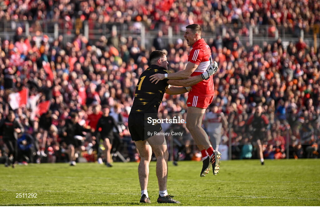 14 May 2023; Ciaran McFaul of Derry, right, celebrates with goalkeeper Odhran Lynch after kicking the winning penalty in the penalty shoot-out in the Ulster GAA Football Senior Championship Final match between Armagh and Derry at St Tiernach’s Park in Clones, Monaghan. Photo by Ramsey Cardy/Sportsfile