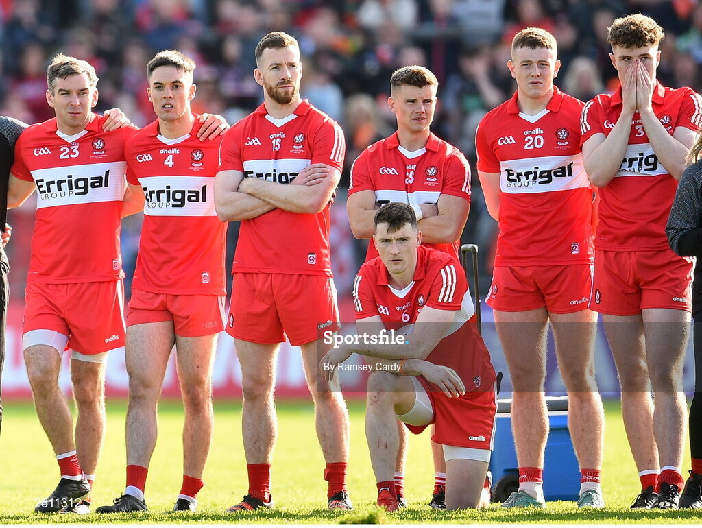 14 May 2023; Derry players watch on during the penalty shoot-out in the Ulster GAA Football Senior Championship Final match between Armagh and Derry at St Tiernach’s Park in Clones, Monaghan. Photo by Ramsey Cardy/Sportsfile