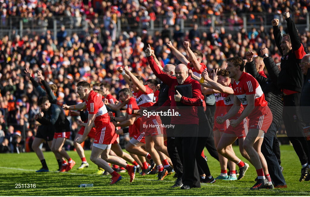 14 May 2023; Derry players and managment celebrate in the penalty shootout during the Ulster GAA Football Senior Championship Final match between Armagh and Derry at St Tiernach’s Park in Clones, Monaghan. Photo by Harry Murphy/Sportsfile